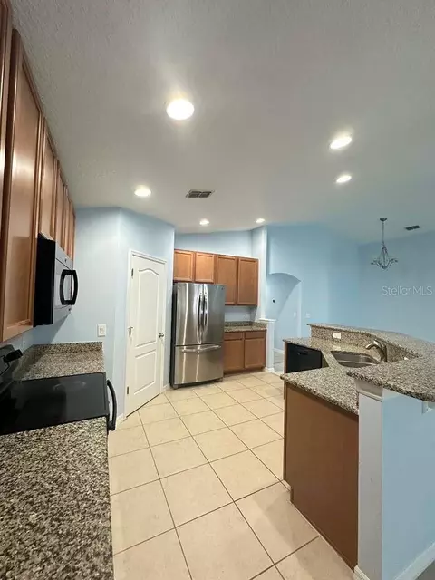 Kitchen - 10816 Cabbage Tree Loop, Orlando, FL 32825 photo 1 of 1