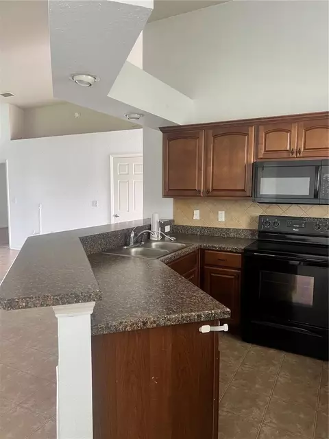 Kitchen - 3739 Ricky Ln, Saint Cloud, FL 34772 photo 5 of 6