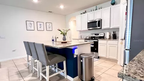 Kitchen - 5406 Pine Lilly Dr, Saint Cloud, FL 34771 photo 4 of 6