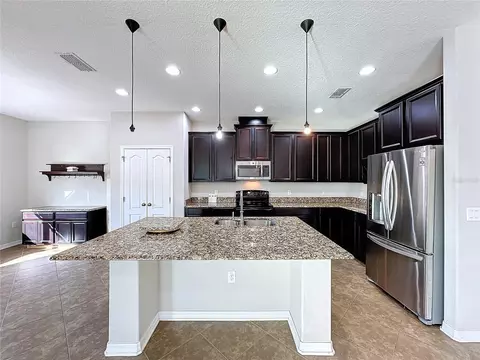 Kitchen - 5121 Appenine Loop W, Saint Cloud, FL 34771 photo 1 of 3