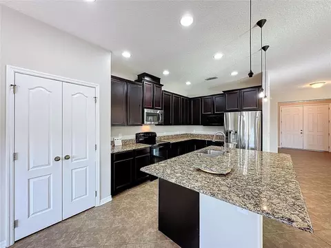 Kitchen - 5121 Appenine Loop W, Saint Cloud, FL 34771 photo 3 of 3