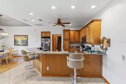 Kitchen - 1300 S Narcoossee Rd, Saint Cloud, FL 34771 photo 2 of 4