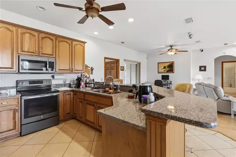 Kitchen - 1300 S Narcoossee Rd, Saint Cloud, FL 34771 photo 3 of 4