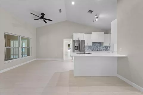 Living - 2082 Camelot Blvd, Saint Cloud, FL 34772 photo 9 of 9