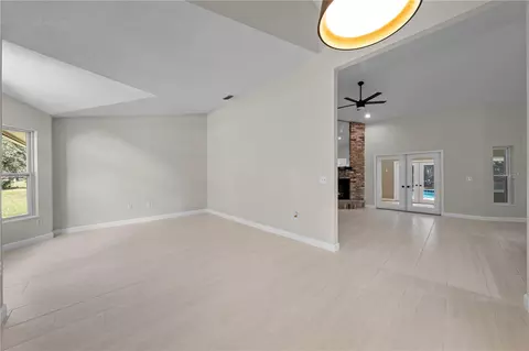 Living - 2082 Camelot Blvd, Saint Cloud, FL 34772 photo 2 of 9