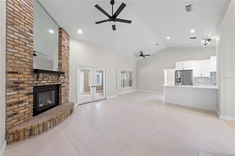 Living - 2082 Camelot Blvd, Saint Cloud, FL 34772 photo 4 of 9