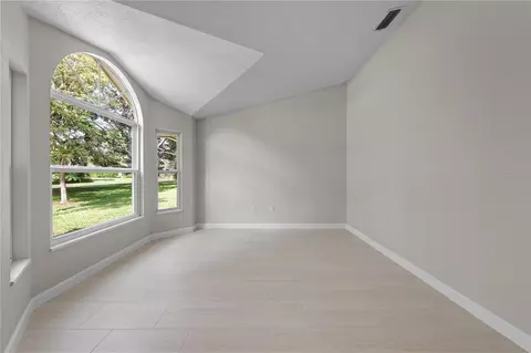 Living - 2082 Camelot Blvd, Saint Cloud, FL 34772 photo 3 of 9