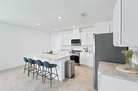 Kitchen - 2733 Reddish Egret Bnd, Harmony, FL 34773 photo 5 of 5