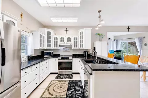 Kitchen - 5381 Alligator Lake Rd, Saint Cloud, FL 34772 photo 3 of 3