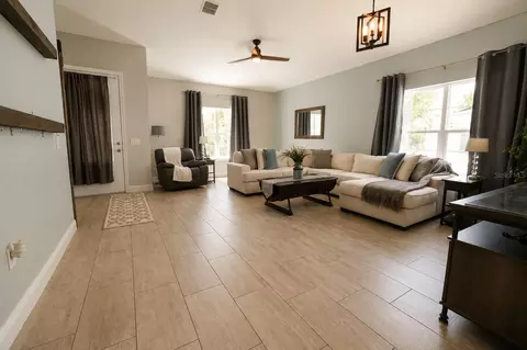 Living - 3485 Middlebrook Pl, Harmony, FL 34773 photo 3 of 3
