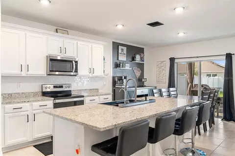 Kitchen - 2533 Harmonia Hammock Rd, Harmony, FL 34773 photo 5 of 8