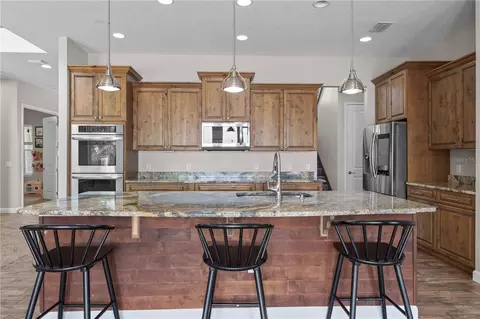 Kitchen - 4664 Hickory Tree Ln, Saint Cloud, FL 34772 photo 10 of 11