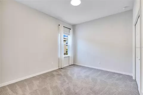 Bedroom - 5447 Pine Lilly Dr, Saint Cloud, FL 34771 photo 5 of 7