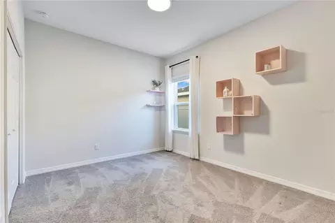 Bedroom - 5447 Pine Lilly Dr, Saint Cloud, FL 34771 photo 4 of 7