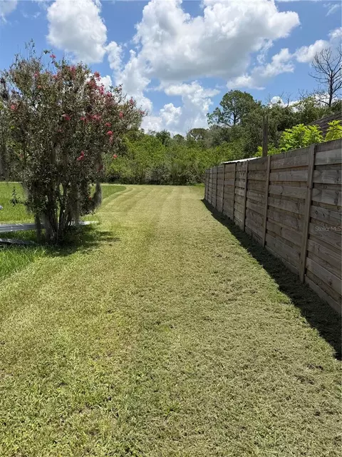 Exterior - 1315 S Shore Dr, Saint Cloud, FL 34771 photo 7 of 11