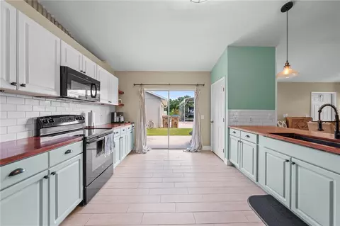 Kitchen - 4865 Meadow Dr, Saint Cloud, FL 34772 photo 1 of 4