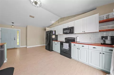 Kitchen - 4865 Meadow Dr, Saint Cloud, FL 34772 photo 3 of 4