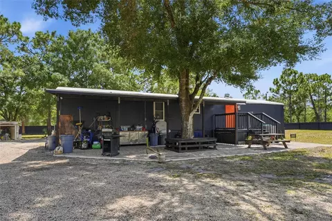 Exterior - 9295 Luna Dr, Saint Cloud, FL 34773 photo 4 of 12