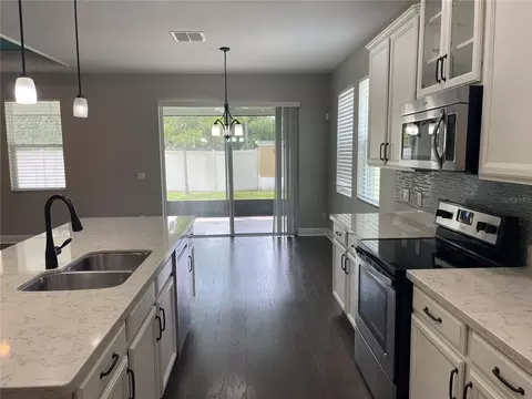 Kitchen - 3560 Pixie Ln, Saint Cloud, FL 34772 photo 3 of 4