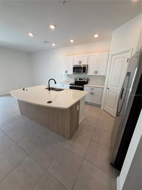 4870 Spangle Dr, Saint Cloud, FL 34769 photo 2