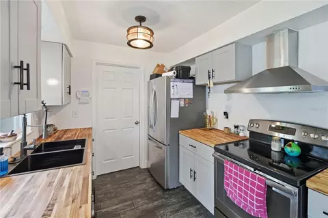 Kitchen - 407 Tennessee Ave, Saint Cloud, FL 34769 photo 2 of 2