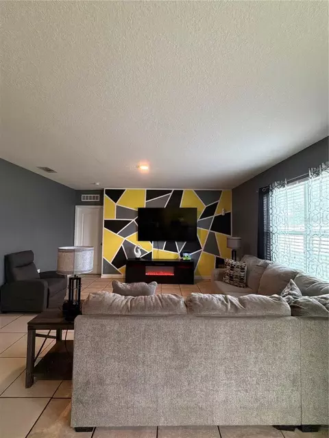 Living - 1876 Cassidy Knoll Dr, Kissimmee, FL 34744 photo 2 of 3