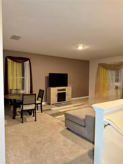Living - 1876 Cassidy Knoll Dr, Kissimmee, FL 34744 photo 3 of 3