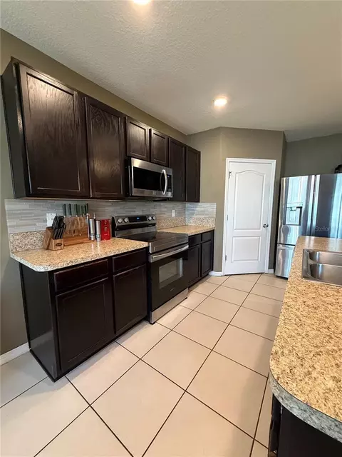 Kitchen - 1876 Cassidy Knoll Dr, Kissimmee, FL 34744 photo 3 of 9