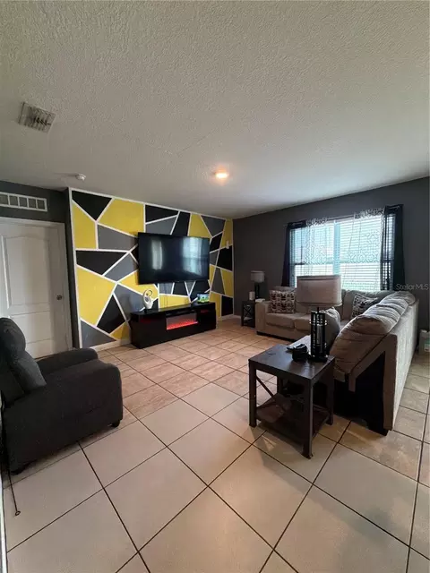 Living - 1876 Cassidy Knoll Dr, Kissimmee, FL 34744 photo 1 of 3