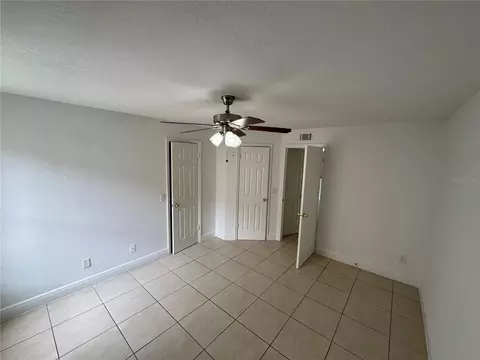 Bedroom - 4532 Commander Dr #2128, Orlando, FL 32822 photo 4 of 7