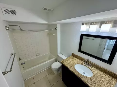 Bath - 4532 Commander Dr #2128, Orlando, FL 32822 photo 2 of 2