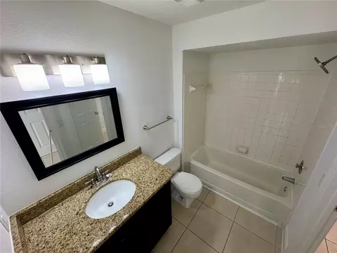 Bath - 4532 Commander Dr #2128, Orlando, FL 32822 photo 1 of 2