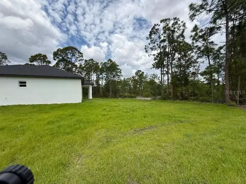 Exterior - 723 Epps Brown St E, Lehigh Acres, FL 33974 photo 8 of 12