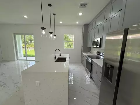 Kitchen - 723 Epps Brown St E, Lehigh Acres, FL 33974 photo 3 of 4
