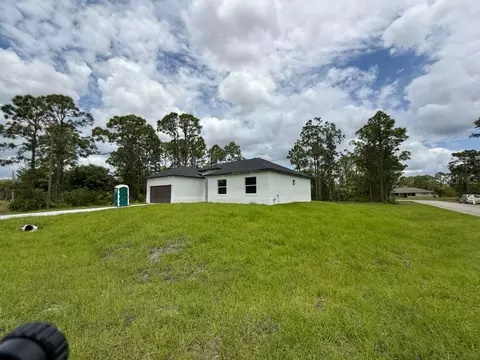 Exterior - 723 Epps Brown St E, Lehigh Acres, FL 33974 photo 9 of 12