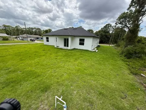 Exterior - 723 Epps Brown St E, Lehigh Acres, FL 33974 photo 5 of 12