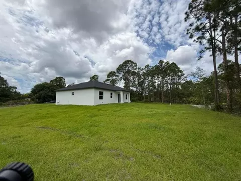 Exterior - 723 Epps Brown St E, Lehigh Acres, FL 33974 photo 7 of 12