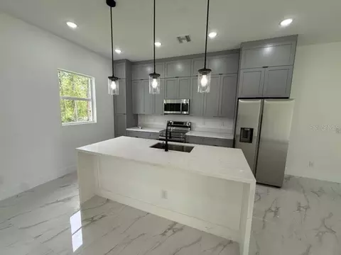 Kitchen - 723 Epps Brown St E, Lehigh Acres, FL 33974 photo 1 of 4