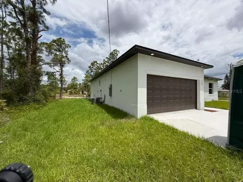 Exterior - 723 Epps Brown St E, Lehigh Acres, FL 33974 photo 4 of 12