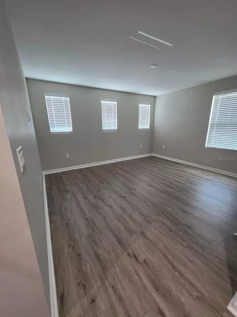 Living - 4382 Southern Vista Loop, Saint Cloud, FL 34771 photo 3 of 3