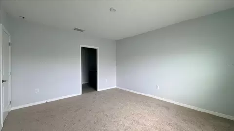 Bedroom - 486 Pine Tree Bridge Trl, Saint Cloud, FL 34772 photo 13 of 13