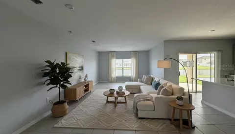 Living - 486 Pine Tree Bridge Trl, Saint Cloud, FL 34772 photo 2 of 3