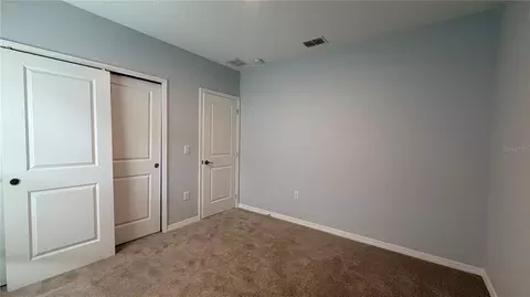Bedroom - 486 Pine Tree Bridge Trl, Saint Cloud, FL 34772 photo 3 of 13