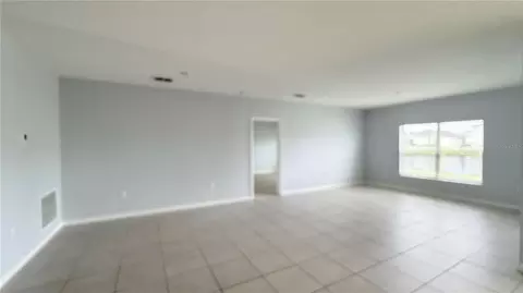 Living - 486 Pine Tree Bridge Trl, Saint Cloud, FL 34772 photo 3 of 3