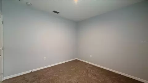 Bedroom - 486 Pine Tree Bridge Trl, Saint Cloud, FL 34772 photo 10 of 13