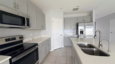 Kitchen - 486 Pine Tree Bridge Trl, Saint Cloud, FL 34772 photo 1 of 2