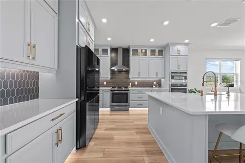 Kitchen - 4979 Rain Shadow Dr, Saint Cloud, FL 34772 photo 9 of 12