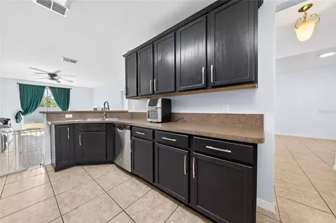 Kitchen - 5590 Silver Thistle Ln, Saint Cloud, FL 34772 photo 2 of 3