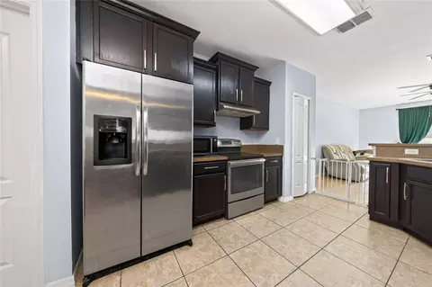 Kitchen - 5590 Silver Thistle Ln, Saint Cloud, FL 34772 photo 3 of 3
