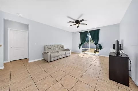 Living - 5590 Silver Thistle Ln, Saint Cloud, FL 34772 photo 2 of 2